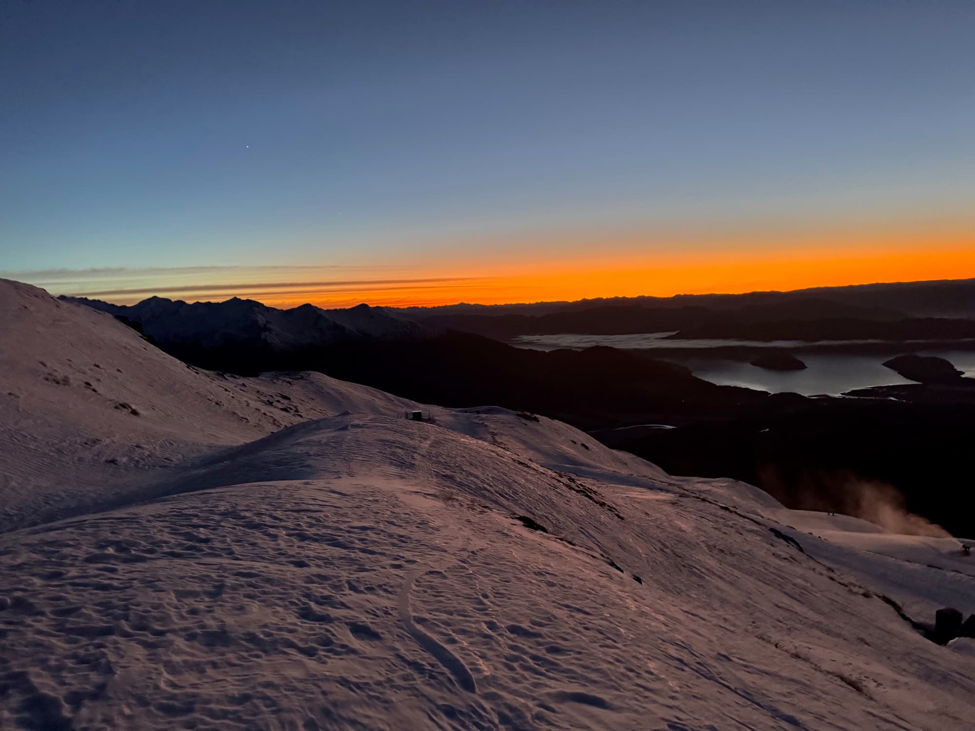 Mountain reflection in a glassy fjord