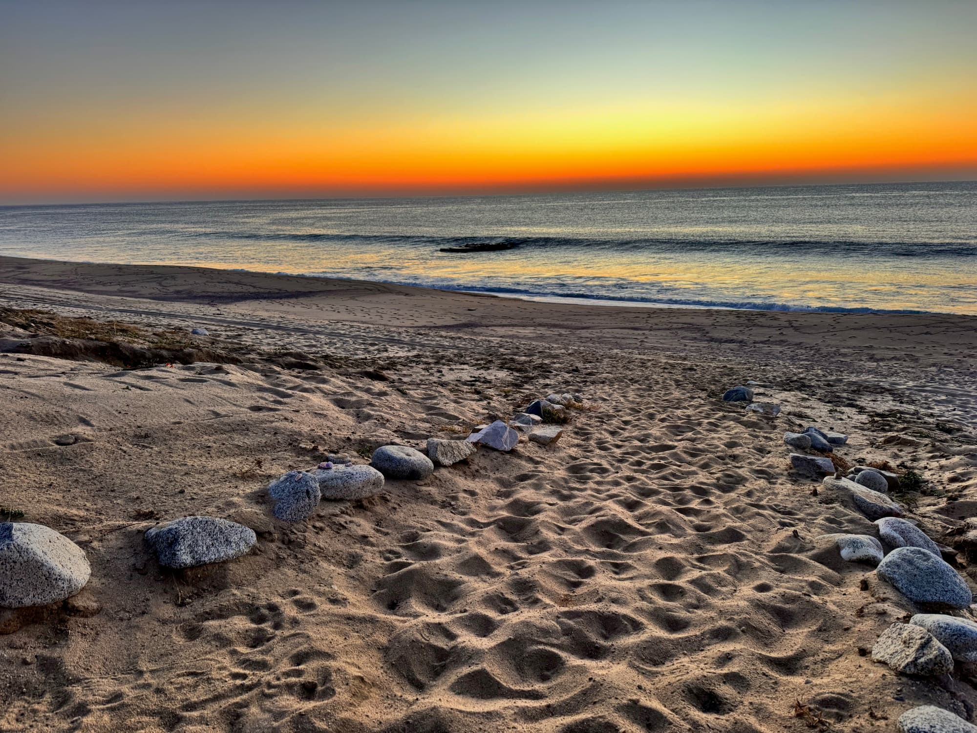 Golden sunset over the North Atlantic from a remote beach